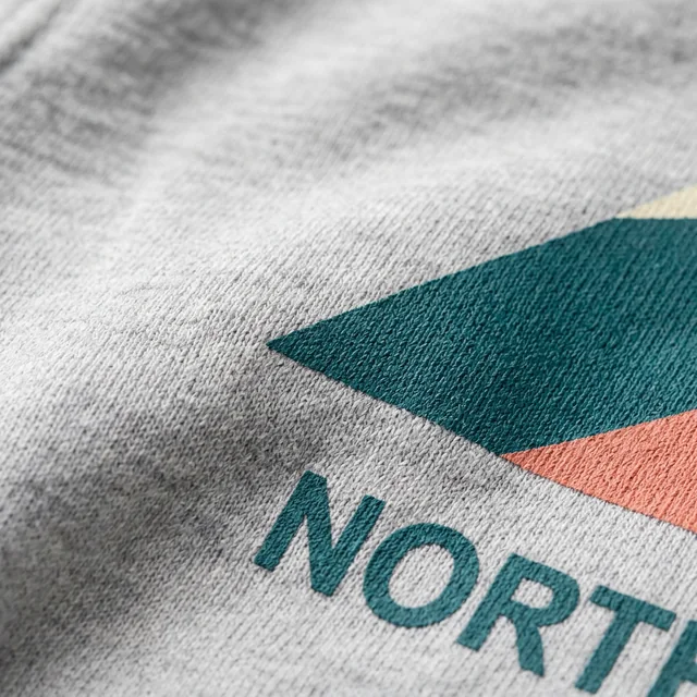 Gray hoodie mockup with NORTH 07 artwork in the ink and fabric detail scene